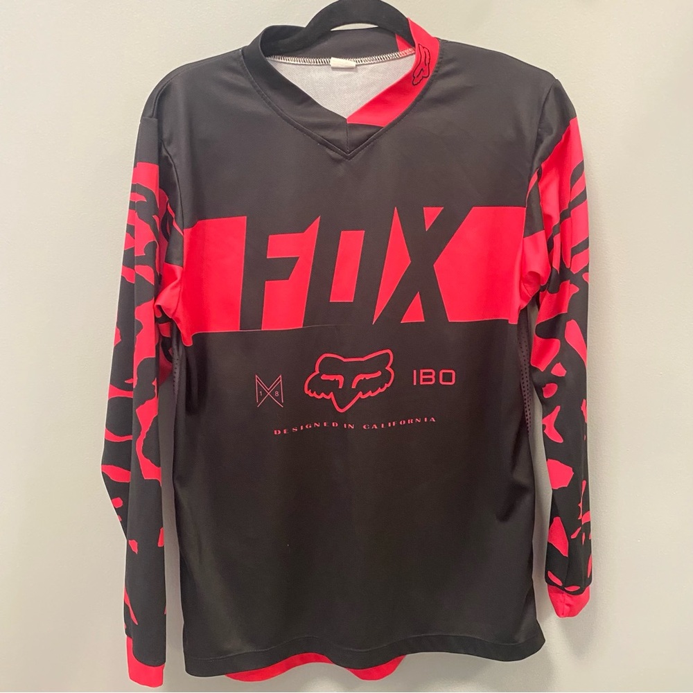 Fox Racing pink and black woman’s jersey, small